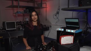 placeholder image — ASP student Sakshi Sharma explains the SPDC experiment in the quantum lab.